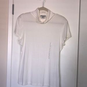 Never worn short sleeve turtle neck blouse